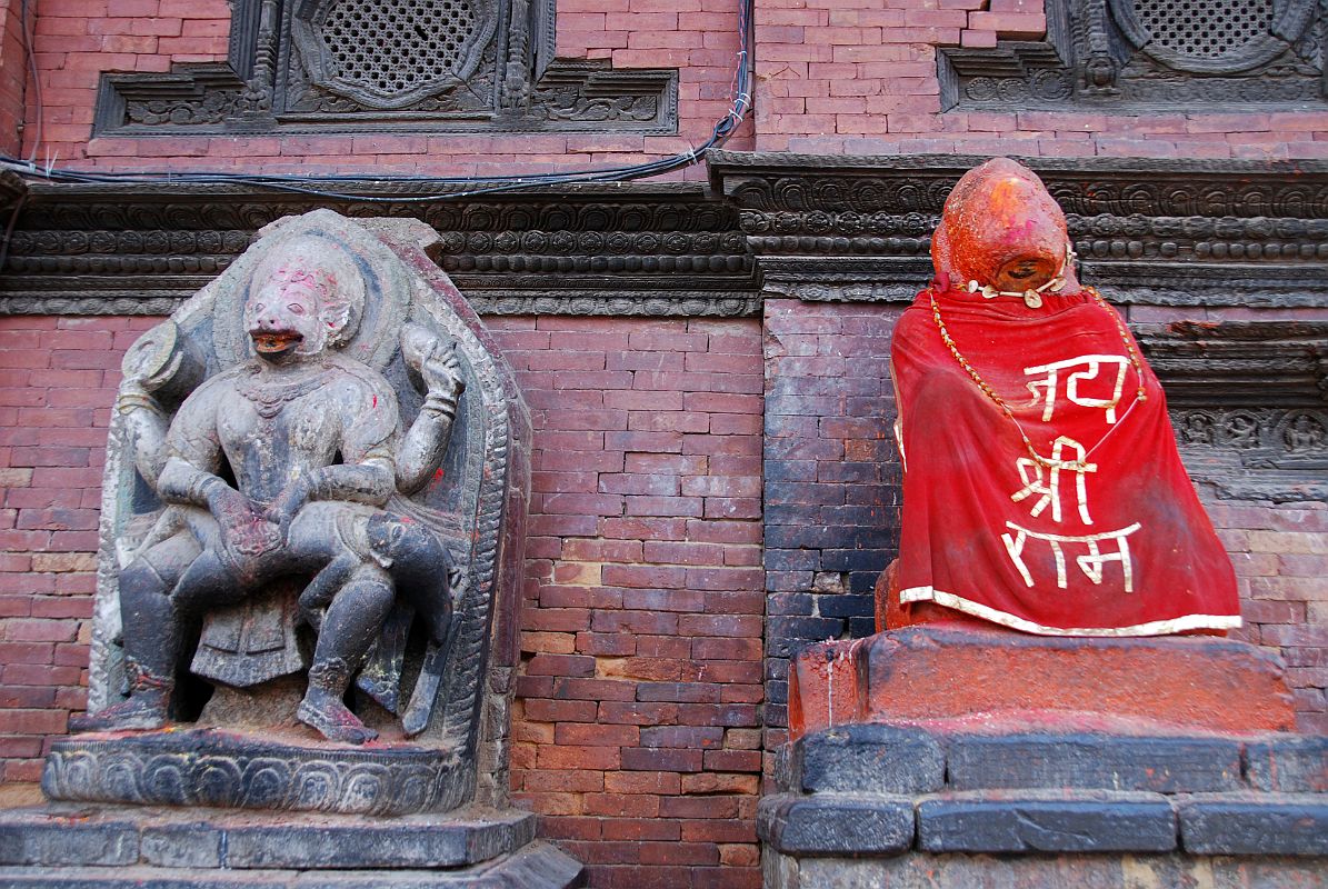Kathmandu Patan Durbar Square 04 Statues Of Vishnu As Narsingha Man-Lion Disembowelling A Nasty Demon and Hanuman The Monkey God Outside Sundari Chowk 